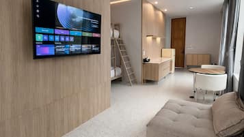 Family Quadruple Room, Garden View | In-room safe, desk, free WiFi, bed sheets