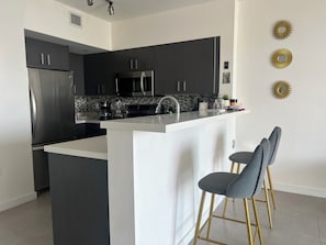 Private kitchen - Cozy 1-bedroom apartment in lovely New York with AC (New York)