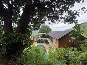 Family Room, Balcony, Mountain View | Property grounds - Dharti - Soil Stories (Wai)