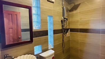 Shower, free toiletries, hair dryer, slippers