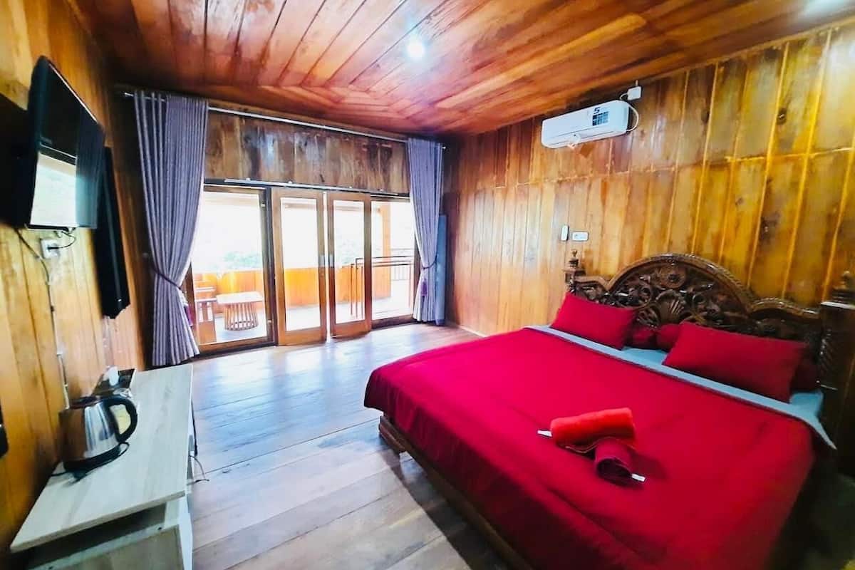 Quarto família, vista para a montanha