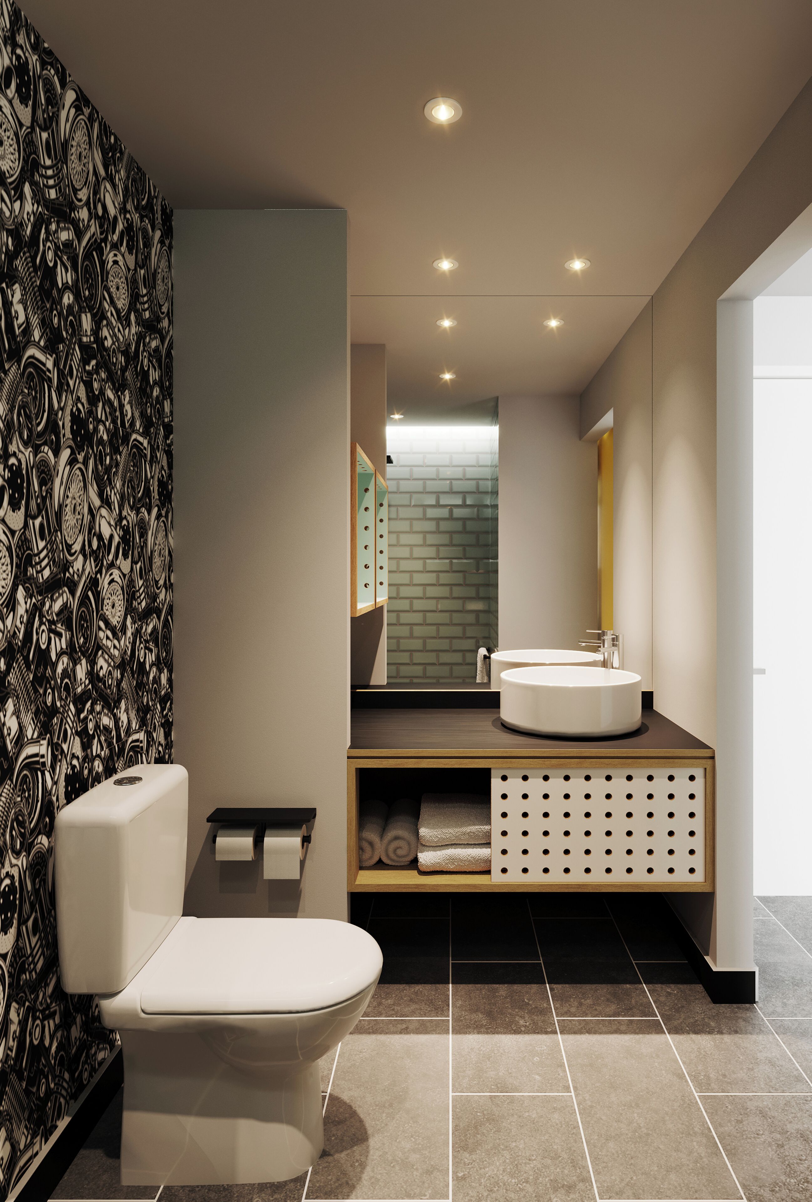 A modern bathroom with a toilet, sink, and mirror.