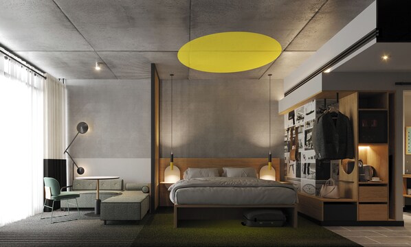 Un dormitorio moderno con cama, mesitas de noche, armario y una zona de estar con lámpara.