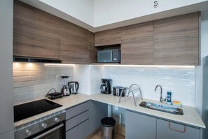 Departamento, vista a la ciudad | Cocina privada