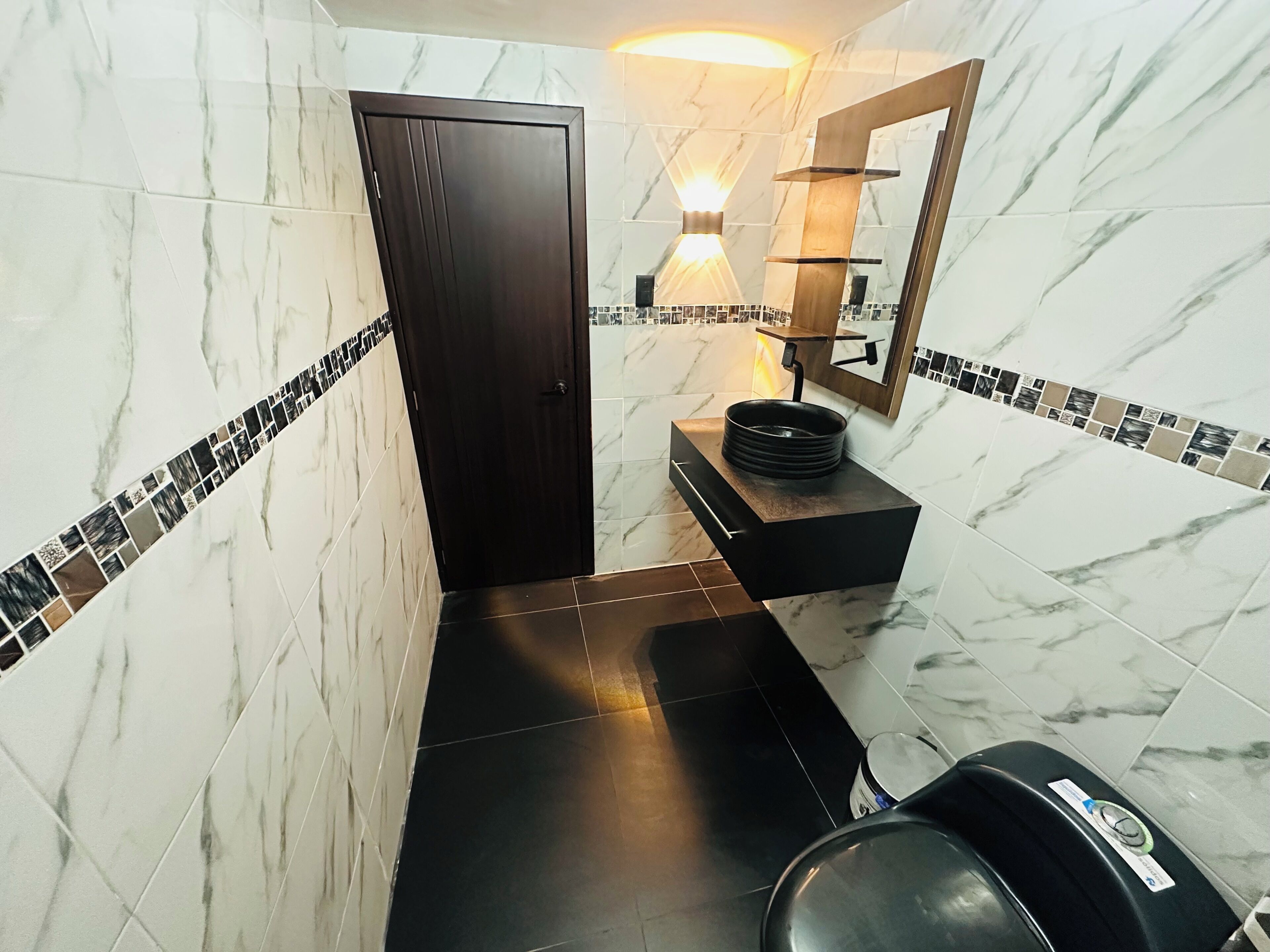 Shower, towels, soap, toilet paper