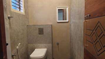 Hair dryer, bidet, towels, soap