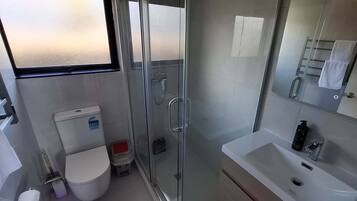 Shower, hair dryer, shampoo