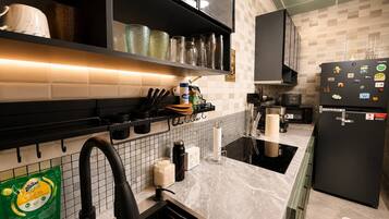 Fridge, microwave, stovetop, coffee/tea maker