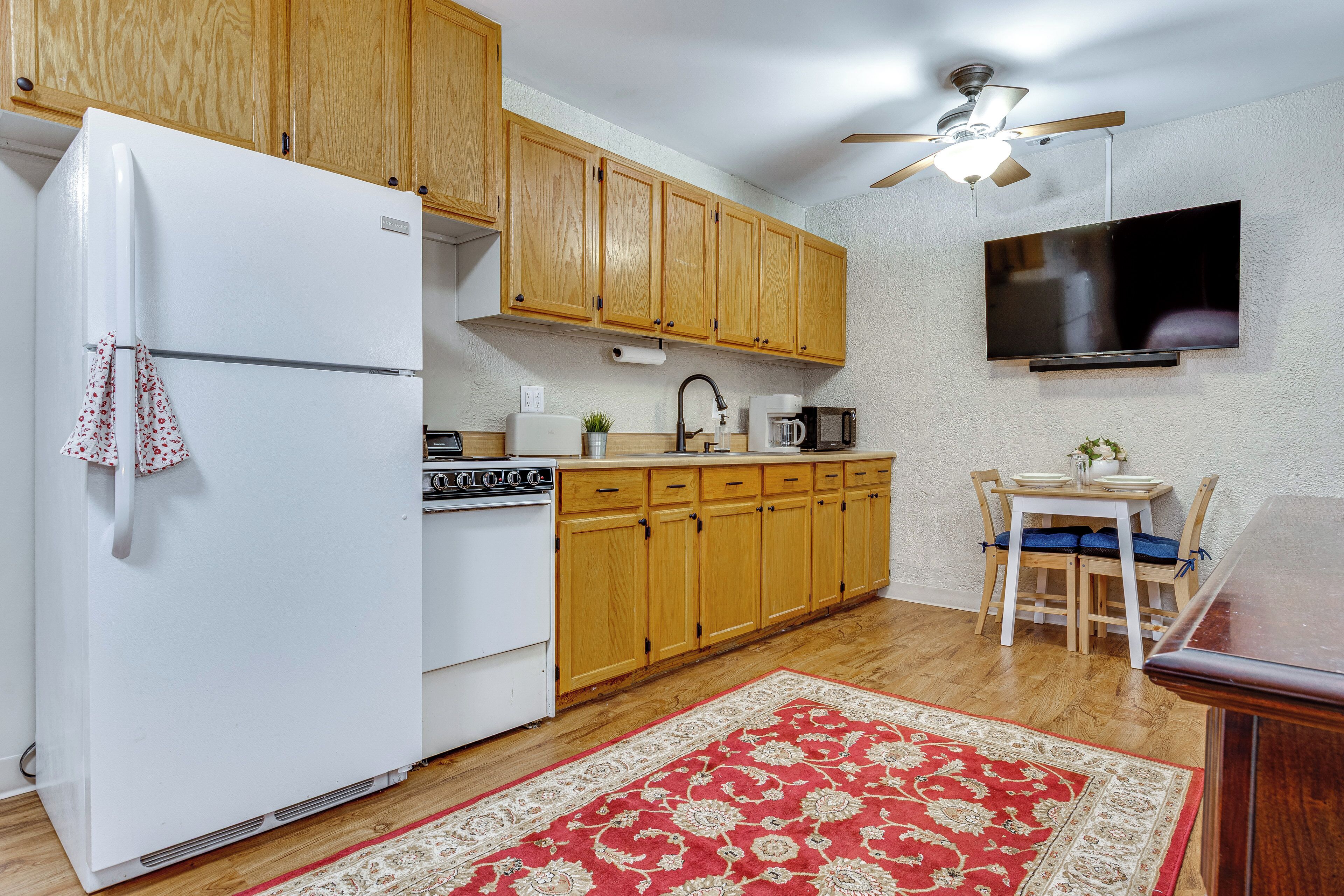 Fridge, microwave, stovetop, coffee/tea maker