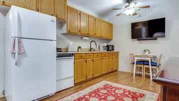 Fridge, microwave, stovetop, coffee/tea maker