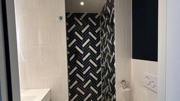 Rainfall showerhead, eco-friendly toiletries, hair dryer, bathrobes