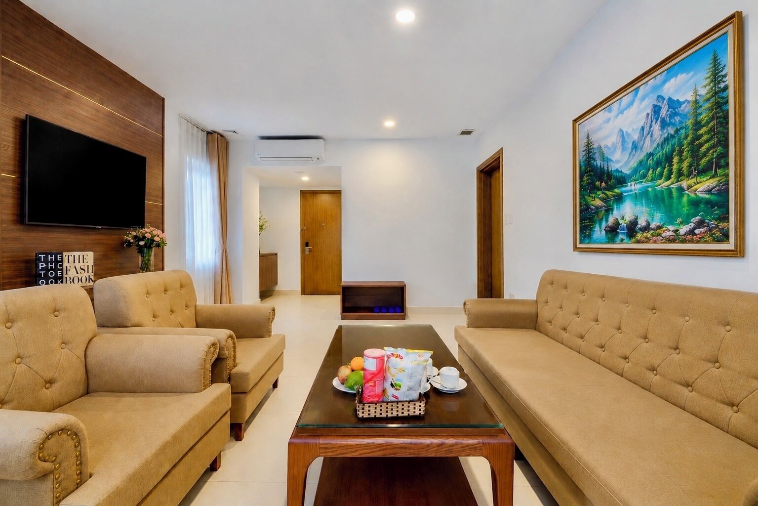 Suite Deluxe, vista al patio | Área de sala de estar