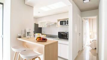 Departamento, vista a la ciudad | Cocina privada