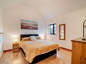A bedroom with a bed, bedside table, nightstand, window, and a painting on the wall. - 2 Bed in Bristol (oc-72836) (Chew Magna)