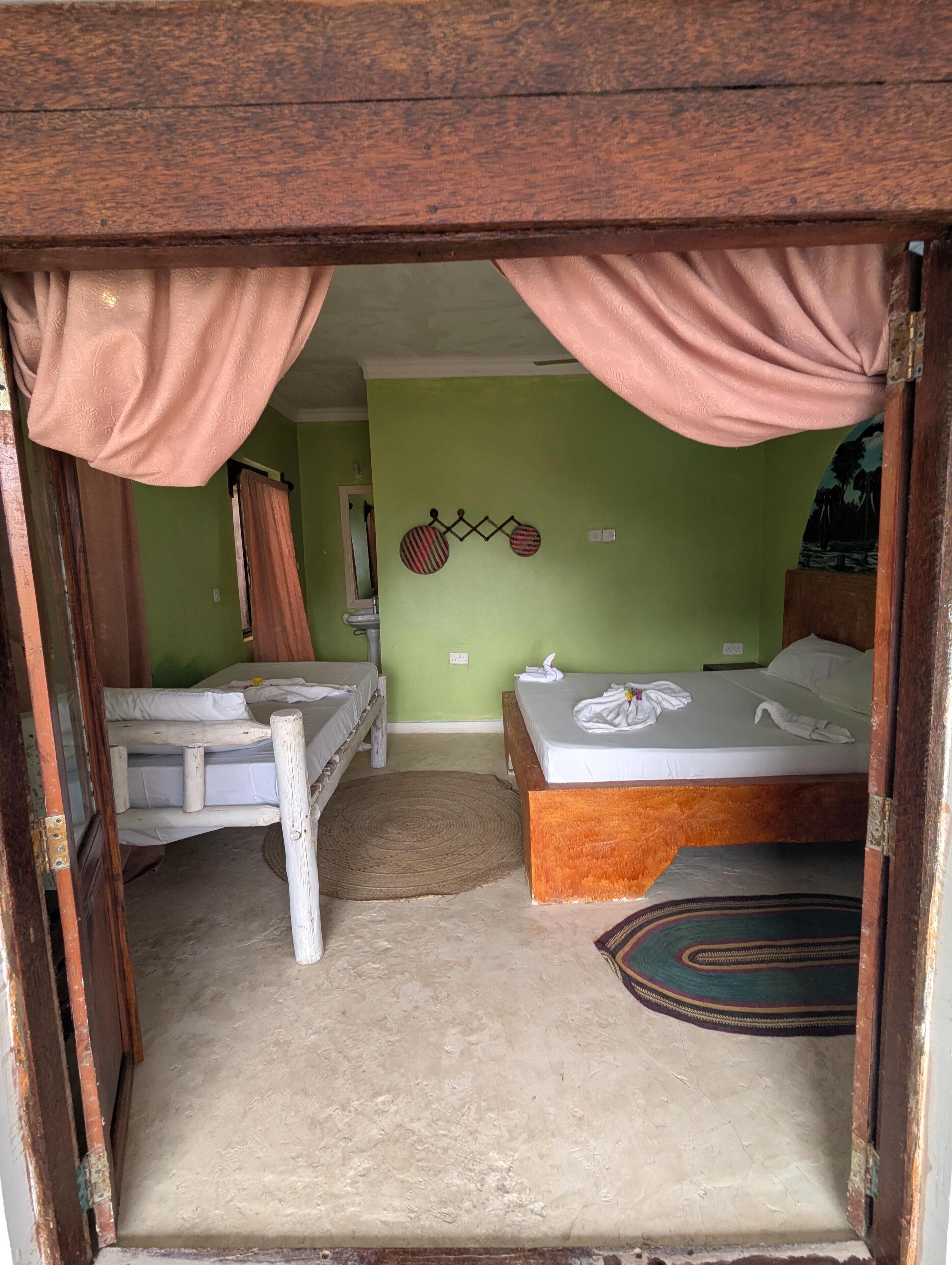 Classic Triple Room, Pool View | Individually decorated