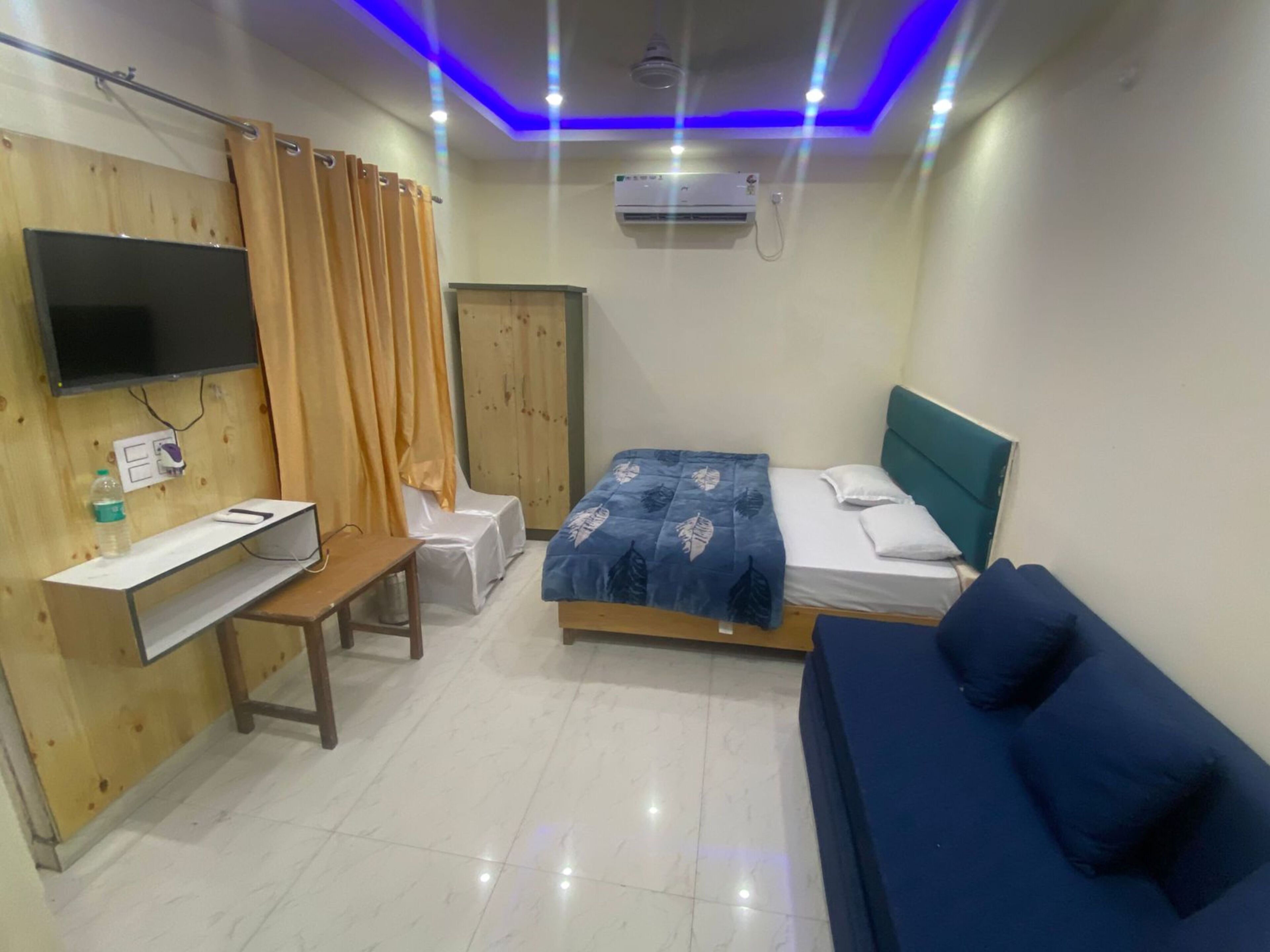 Habitación de lujo | Espacio para trabajar con laptop, camas extra y wifi gratis 