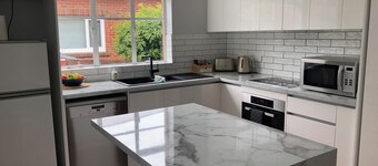 Centrally located! 6 mins to city. Cozy Art Deco renovated family- size house.