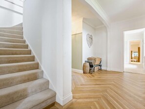 A staircase with carpeted steps leading to a room with a herringbone floor pattern. - 3 Bed in Kirriemuir (oc-75284) (Kirriemuir)
