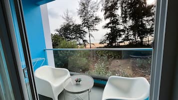 Deluxe Room, Balcony, Sea View | Property grounds
