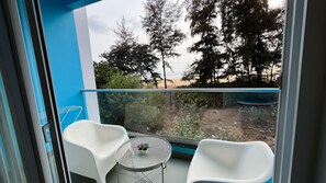 Habitación Deluxe, balcón, vistas al mar | Jardines del alojamiento