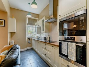 Oven, dishwasher, high chair, cookware/dishes/utensils
