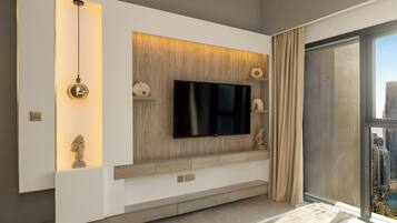 Luxury Apartment, Balcony, City View | In-room safe, blackout curtains, iron/ironing board, free WiFi