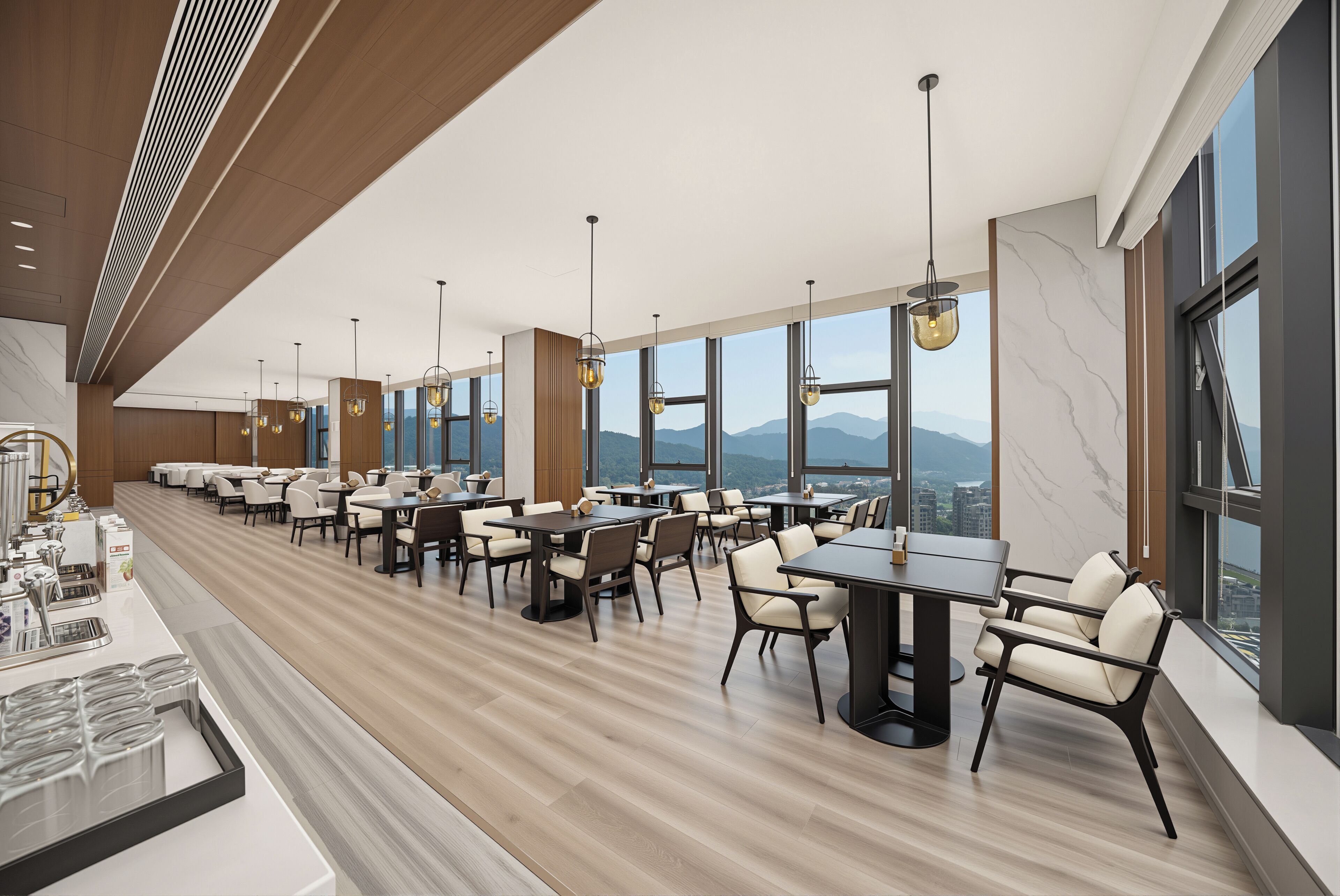 A modern restaurant with high ceilings, large windows, and a view of mountains.