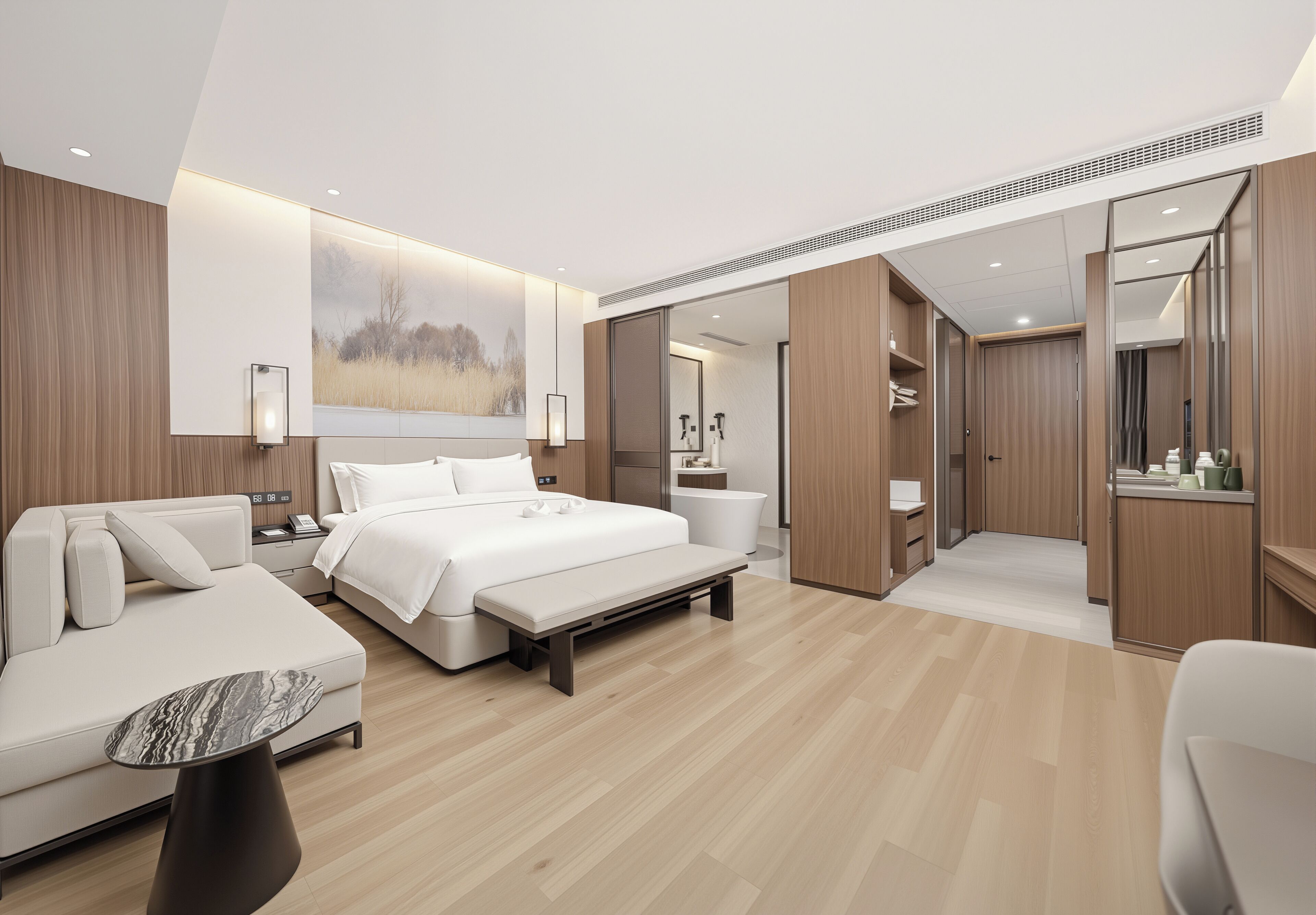 Ein modernes Hotelzimmer mit einem großen Bett, einer Couch, einem kleinen Tisch und einem Badezimmer mit einer Badewanne.