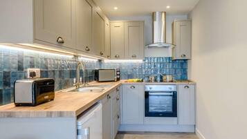 Microwave, oven, highchair, cookware/dishes/utensils