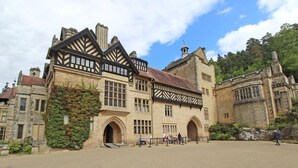 A historic building with a prominent entrance, large windows, and a stone facade. - 2 Bed in Morpeth (oc-82238) (Rothbury)