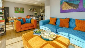 A modern living room with a sofa set, a coffee table, and a painting on the wall. - 2 Bed in Ripon (oc-83763) (Ripon)