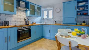 Oven, dishwasher, high chair, cookware/dishes/utensils