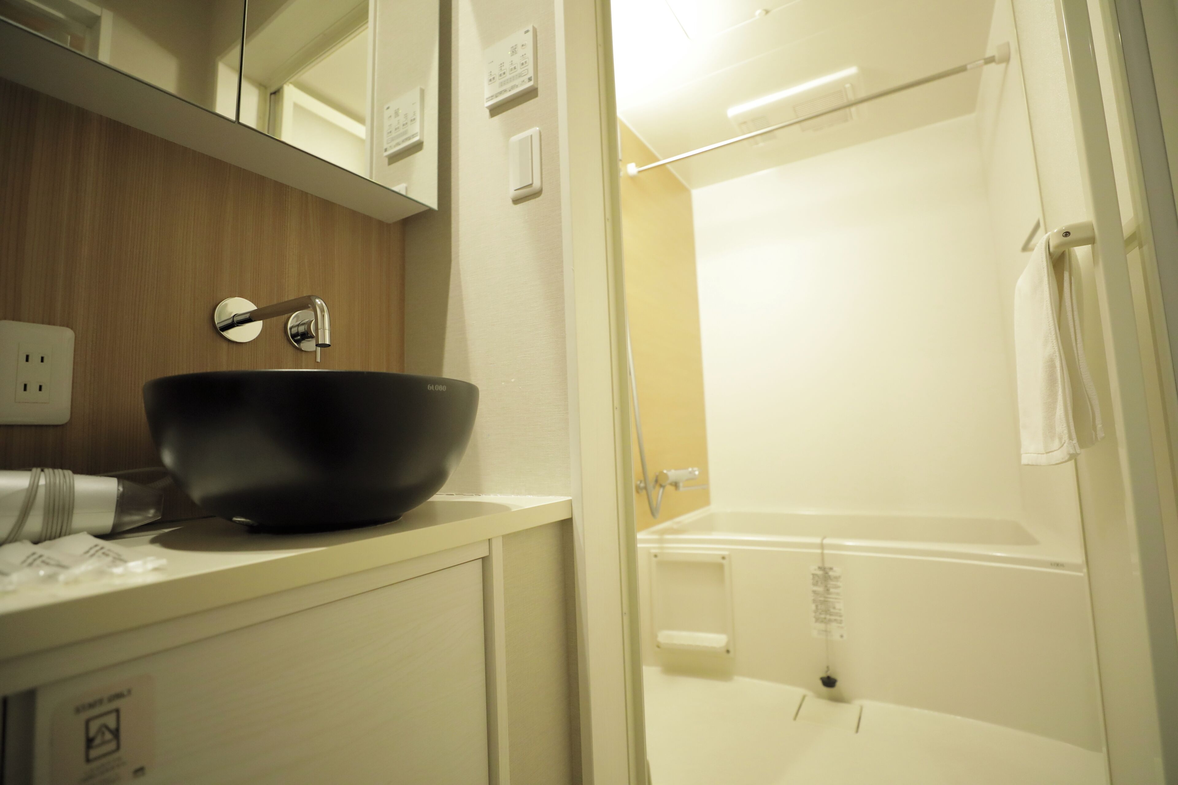 Hair dryer, slippers, bidet, towels