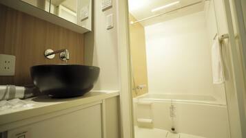 Hair dryer, slippers, bidet, towels