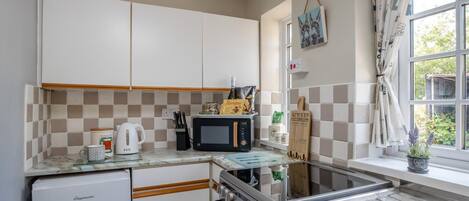 Oven, high chair, cookware/dishes/utensils