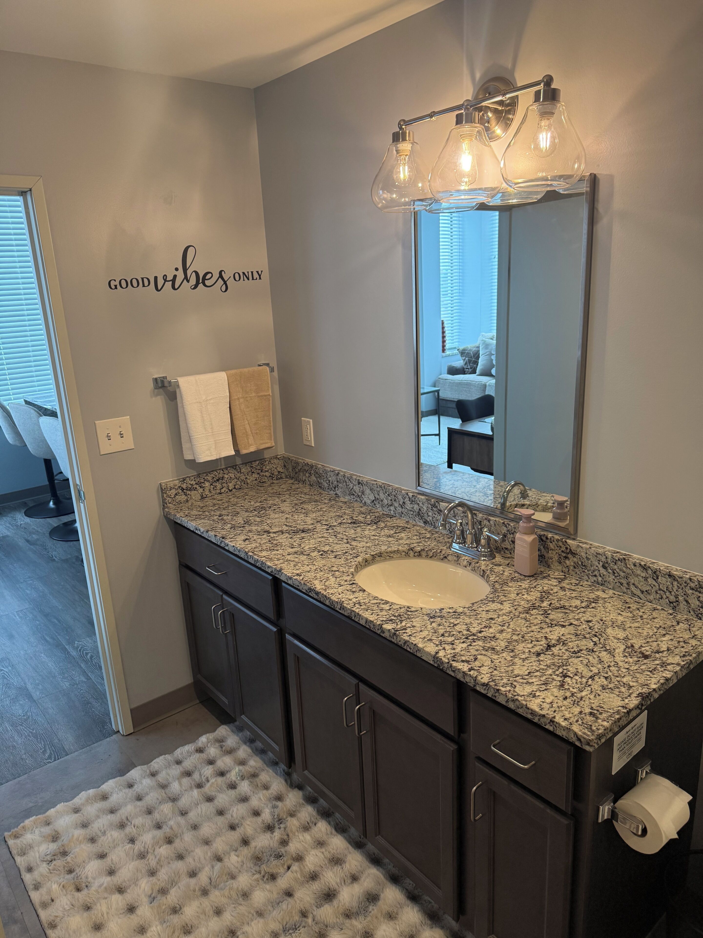 Shower, hair dryer, towels, toilet paper