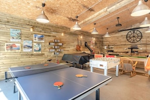 A room with ping pong tables, a foosball table, guitars, and a dartboard. - 1 Bed in Newton Abbot (oc-bbell) (Hennock)