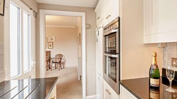 Microwave, oven, high chair, cookware/dishes/utensils
