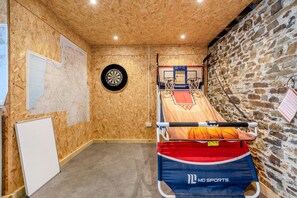 A room with a dartboard, a basketball hoop, and a bed with a sports-themed mattress. - 2 Bed in Beaworthy (oc-wvttb) (Ashwater)