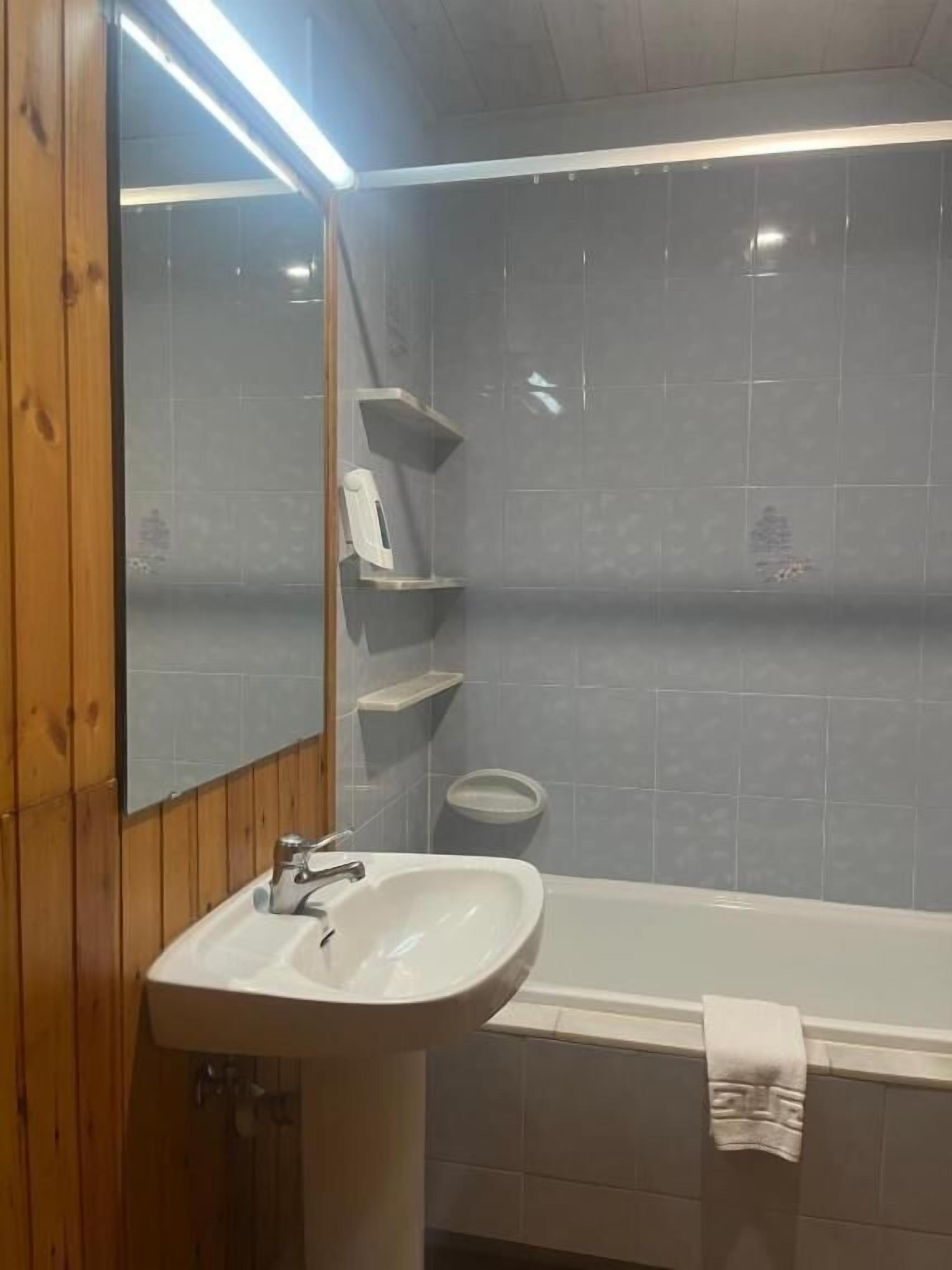 Basic Twin Room, Mountain View | Bathroom | Hair dryer, towels, soap, toilet paper