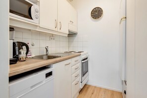 Private kitchen - Cozy Apartment in the City Center (Rovaniemi)