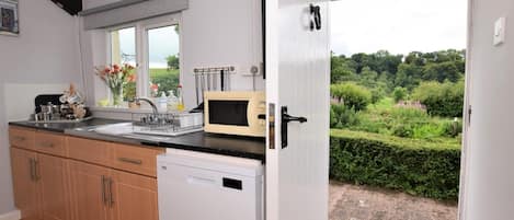 Oven, dishwasher, highchair, cookware/dishes/utensils