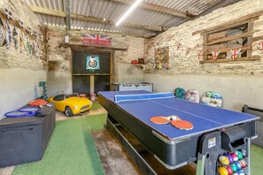 A ping pong table with paddles, a small yellow car, and a pool table with balls. - 2 Bed in Liskeard (oc-04708) (Menheniot)
