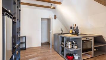 Fridge, stovetop, electric kettle, toaster