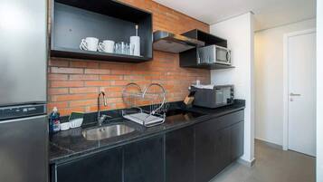Departamento, balcón, vista a la ciudad | Cocina privada