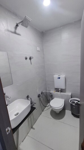 Deluxe Double Room, City View | Bathroom | Free toiletries, slippers, towels, soap - Hotel ICON (Ahmedabad)