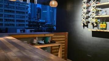 Double Room, City View | Bar (on property)