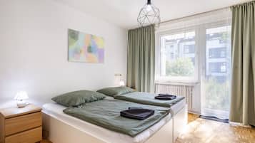 1 dormitorio, tabla de planchar con plancha, wifi y ropa de cama
