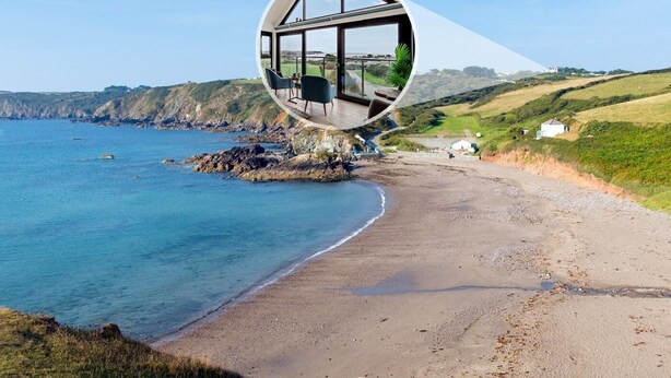 A coastal landscape with a circular viewing platform overlooking the beach and sea. - 2 Bed in Helston (oc-45739) (Kuggar)