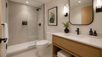 Appartement | Badkamer | Gratis toiletartikelen, een haardroger, handdoeken, zeep